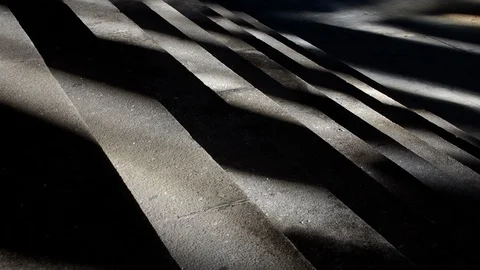 Shadows moving along a flight of stairs. Time lapse Video stock 112753953