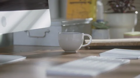 Shadows moving near a computer before lights switching off timelapse Stock Footage 274575375
