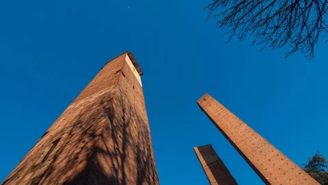 Shadows moving over ancient towers - 4K time lapse Stock Footage 129592254