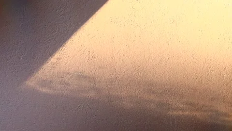 Shadows on old brown color wall video Video stock 168178641