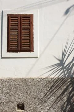Shadows on old house. 스톡 사진