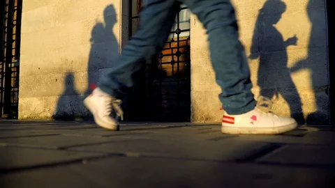 Shadows Of The People On Stone Wall of Pier Stock Footage 116105327