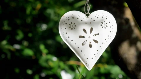 Shadows playing on decorative heart Stock Footage 40942466