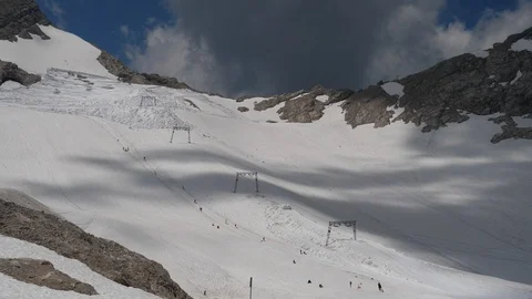 Shadows quickly cast over a ski slope panorama Stock-Footage 120647435