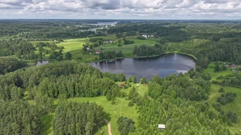 Shadows of quickly running clouds in the countryside landscape Stock Footage 322793872