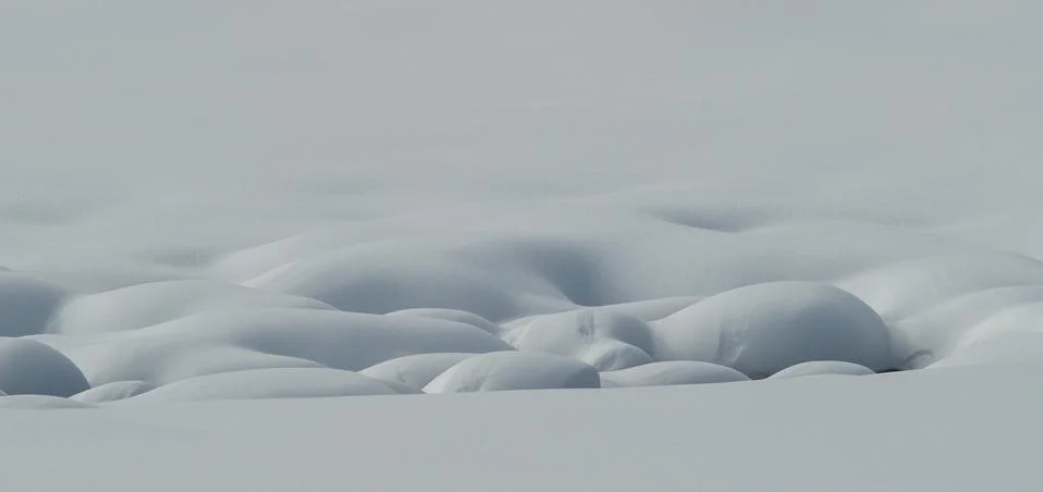 Shadows on snow in mountain Stock Photos