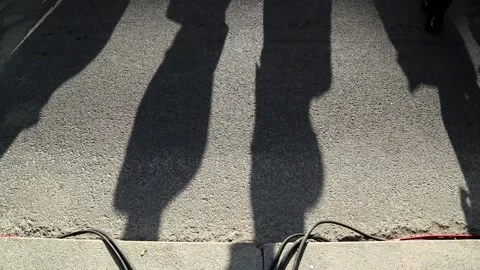 Shadows of soldiers on the pavement Stock Footage 101870953