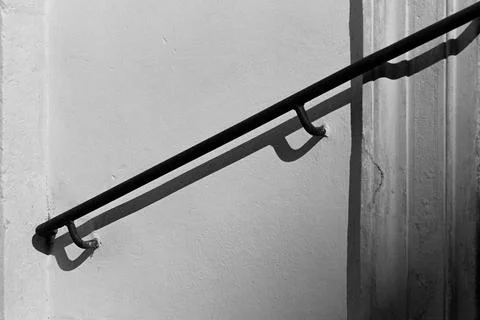 Shadows on a textured wall Stock Photos