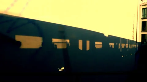 Shadows of train passengers on buildings in Berlin. Stock-Footage 34331805