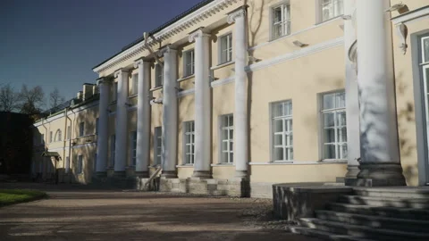 Shadows of the trees moves on the wall of palace Video stock 98273299