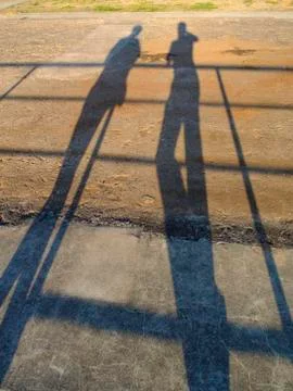 Shadows of Two People Stock Photos