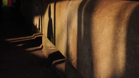 Shadows walking past a wall Stock Footage 292911767