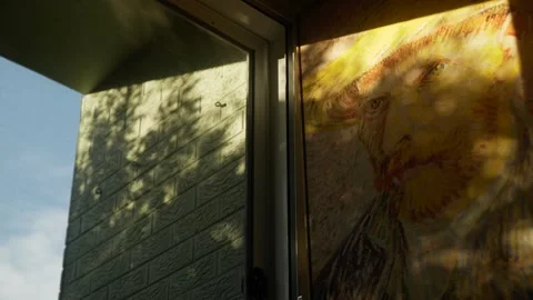 Shadows on a wall and Van Gough print 6K Stock Footage 303389007