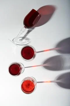 Shadows from wine glasses Stock Photos