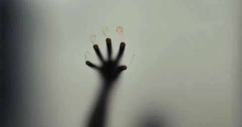 Shadowy figure behind glass Video stock 68942546