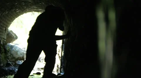Shadowy Figure Walking in Tunnel 動画素材 11410322