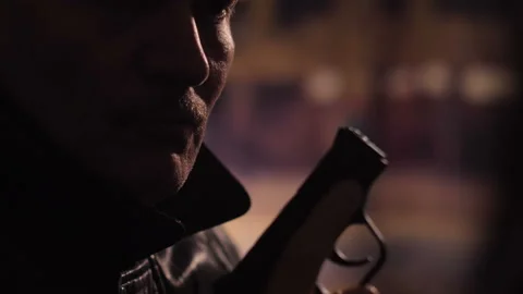 Shadowy Man with Gun at Night 스톡 동영상 236771880