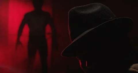 Shadowy Monster Figure in Red Light 스톡 동영상 125941694
