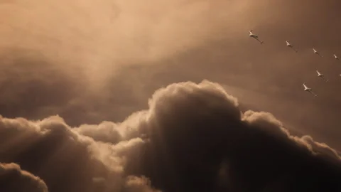 Shahed 136 Kamikaze Drones Flying By to Target with Cloud Light Rays Background Stock Footage 337977412