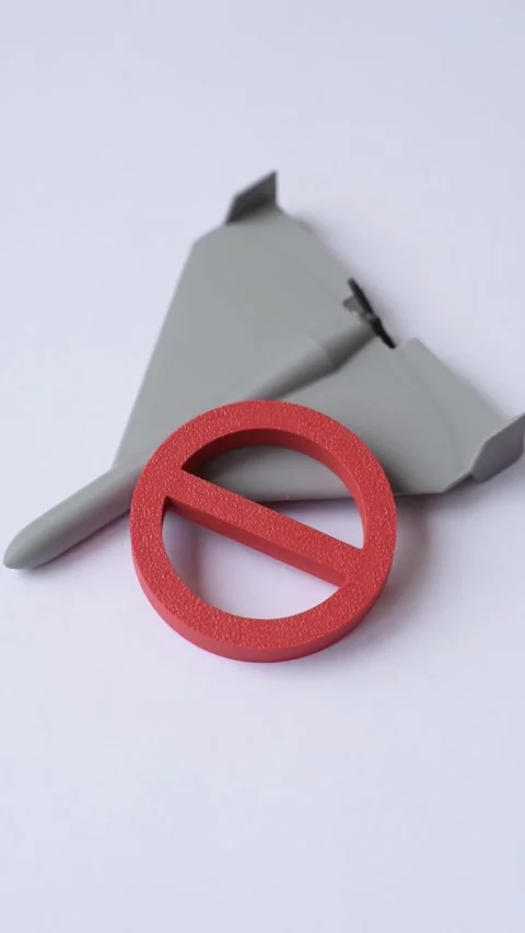 A Shahed drone featuring a prohibition symbol superimposed on the Italian flag Stock Footage 345836125