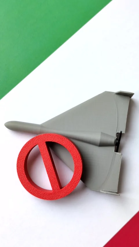 A Shahed drone featuring a prohibition symbol superimposed on the Italian flag Stock Footage 345836482