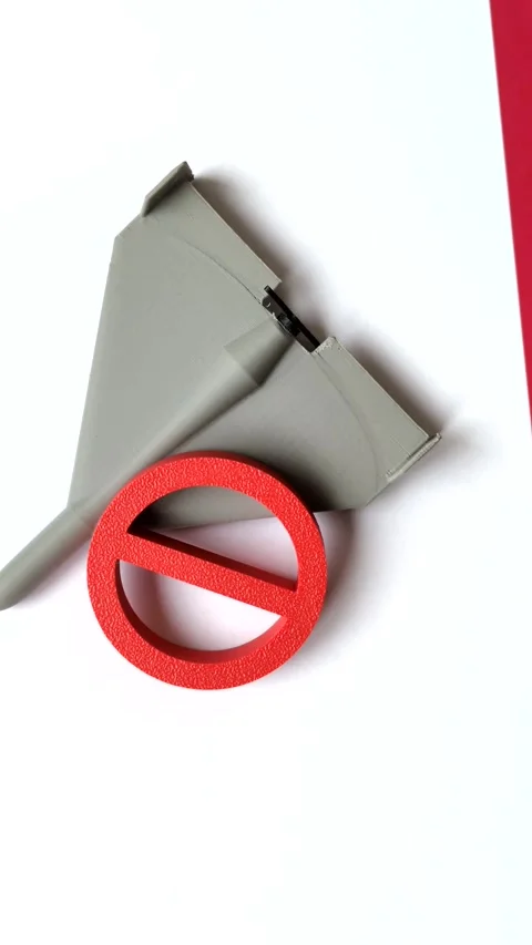 A Shahed drone featuring a prohibition symbol superimposed on the Italian flag Stock Footage 345836489