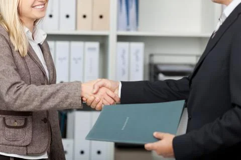Shake hands after an interview Stock Photos