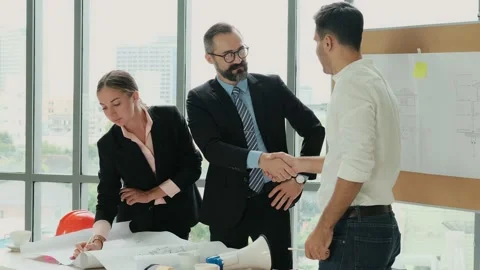 Shake hands to cooperate In the main conference room, we met with a group of  스톡 동영상 153646776