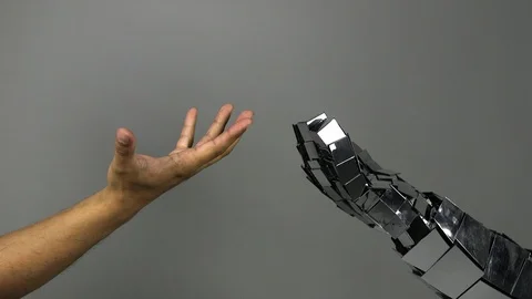 Shake hands with a robot. Stock Footage 91675738