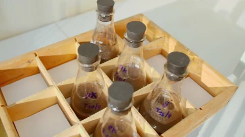 Shaker for mixing solutions for scientific experiment Stock Footage 141267974