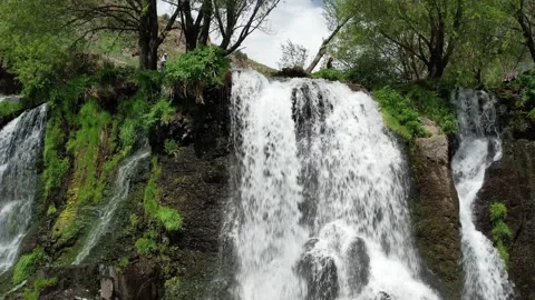 Shaki waterfall cascading below green trees in the Armenian highlands Stock Footage 342847445