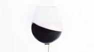 Shaking A Baloon Wineglass To Aerate The Red Wine. Hd Cinemagraph Stock Footage
