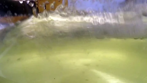 Shaking / boiling water green Stock Footage 81042787