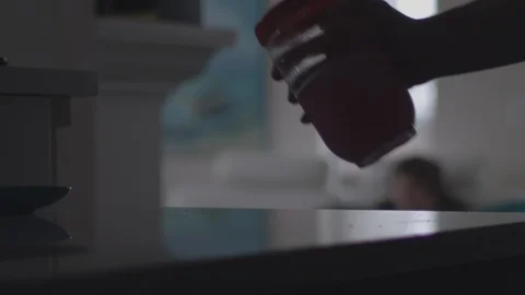 Shaking a closed container with pink pre workout mix in slow motion. Stock Footage 89543106