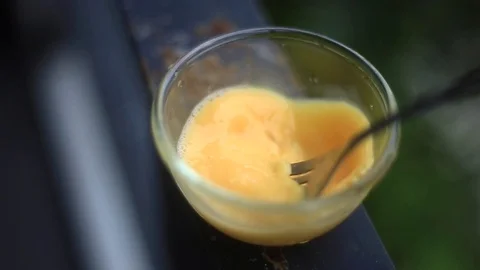 Shaking eggs in a blow Stock Footage 94017761