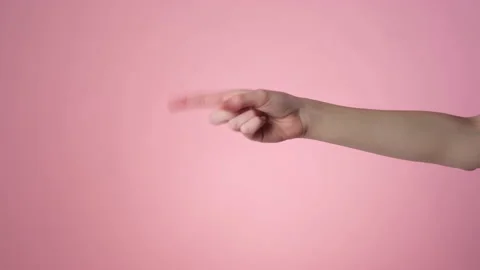 Shaking finger on a pink background 動画素材 171539396