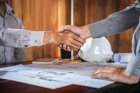 Shaking hands of collaboration, Construction engineering or architect discuss Foto stock