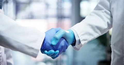 Shaking hands, gloves and team of scientists in laboratory for biotechnology Vídeo Stock 305788196