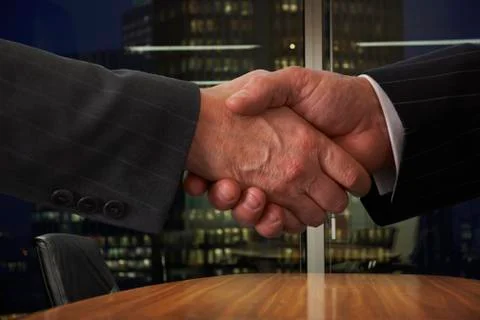 Shaking hands Stock Photos