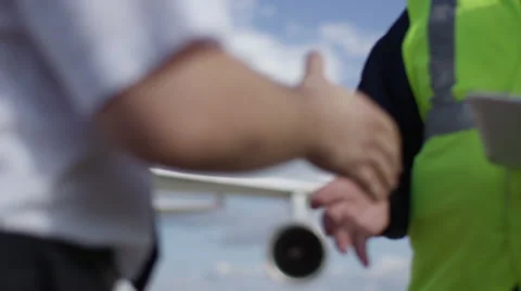 Shaking hands with pilot mechanic Stock-Footage 54546915