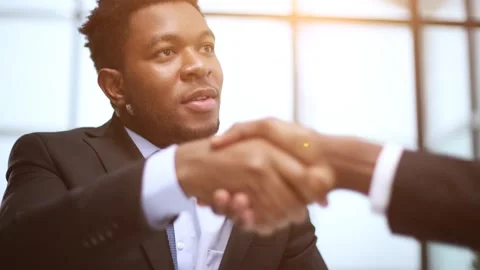 Shaking hands with real estate agent in the office. Stock Footage 282526302