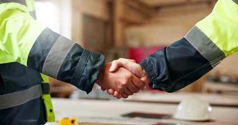 Shaking hands, team and contractor with people in warehouse for manufacturing Stock Photos
