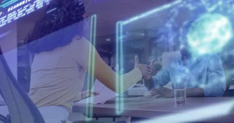 Shaking hands two staff in light tops at conference table, docs, water glass, AR 库存照片