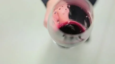 Shaking red wine top view Vidéo 61926603