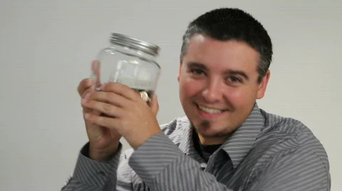 Shaking Savings Jar Stock Footage 836984