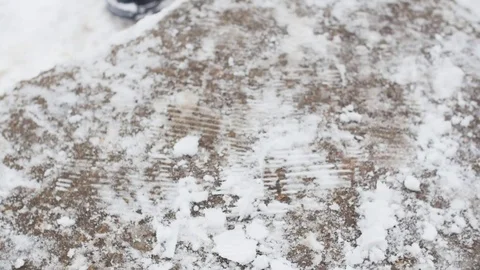 Shaking Snow Off Of Boots Stock Footage 85104003