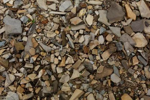 Shale stone texture. Lots of broken stones. River stones. Fotos Stock