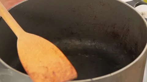 Shallots being fried (close-up) Video stock 24658269