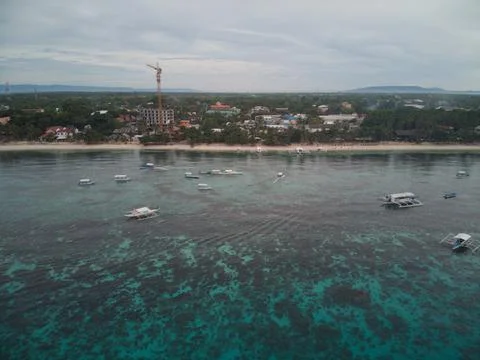 Shallow coral reef patterns off Alona Beach Stock Photos