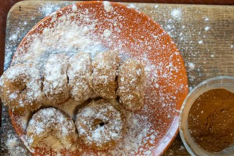 Shallow Depth of Field image of a plate of doughnuts Stock Photos